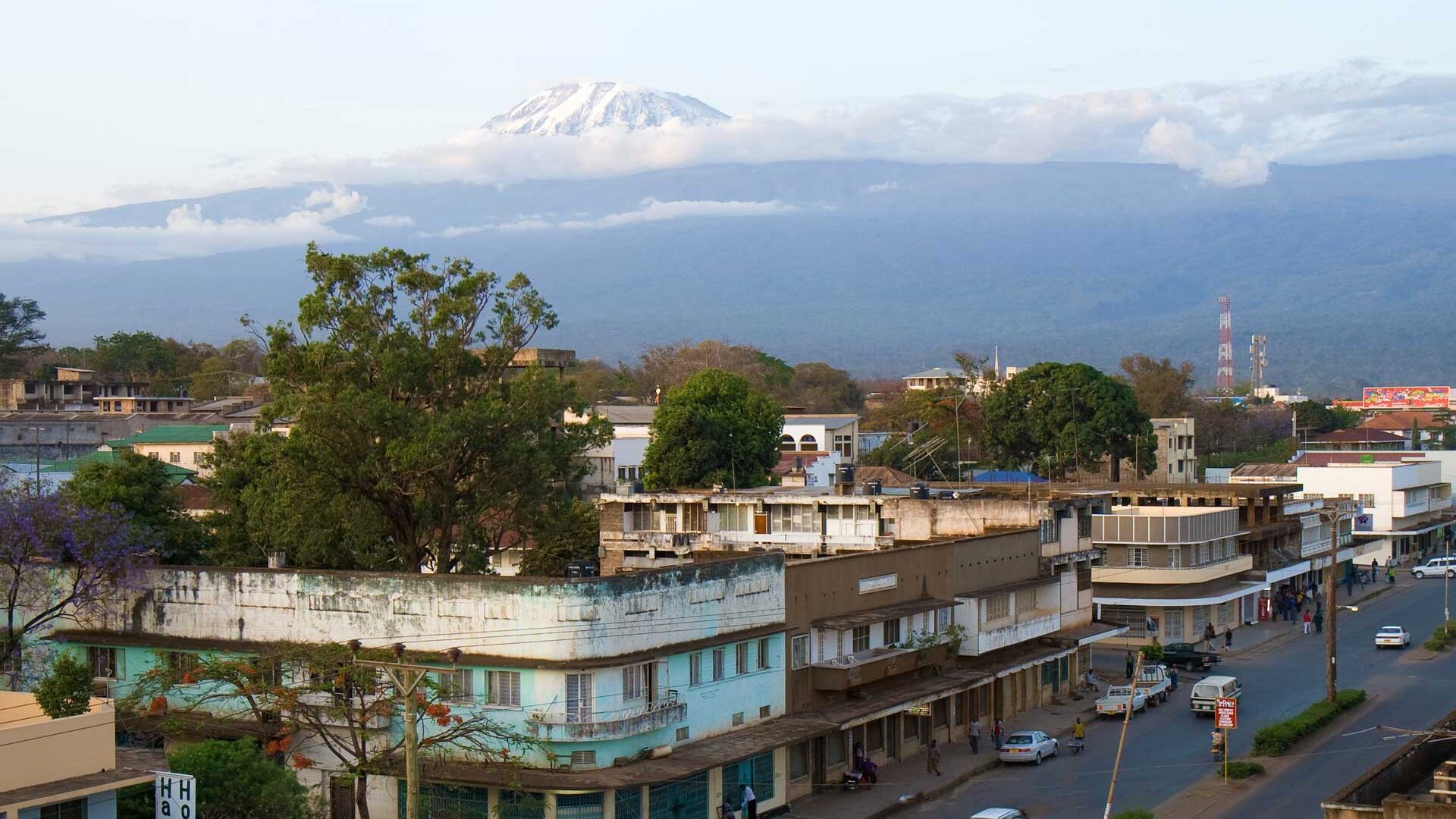 Moshi town with Kilimanjaro's snow cap above the clouds