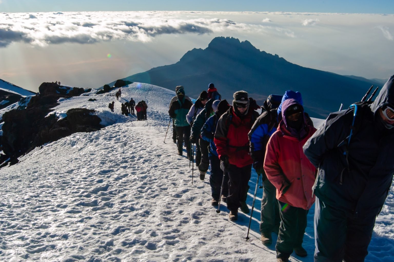 Climbers on snow near the summit