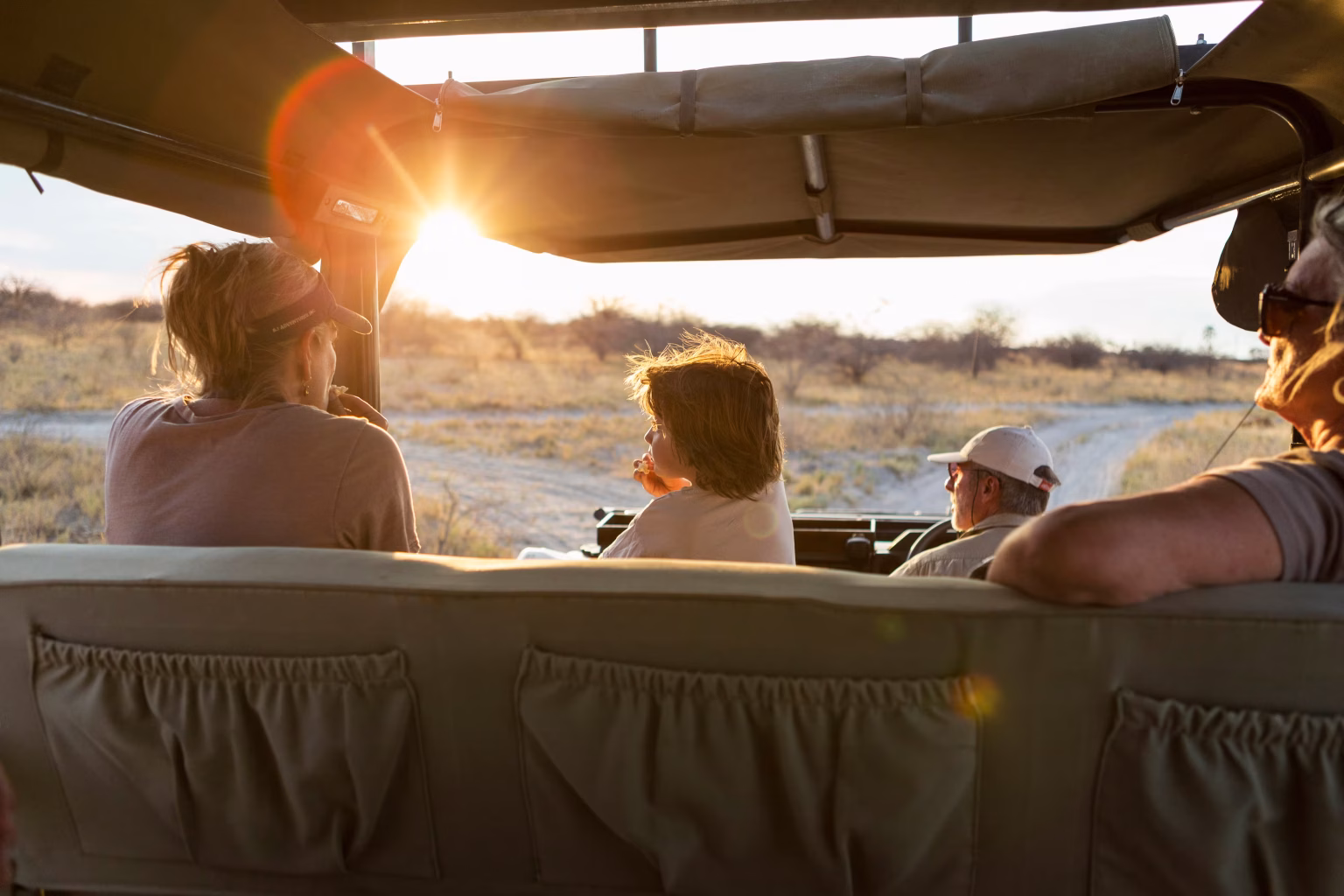 A family on a game drive in the Makgadikgadi, Botswana